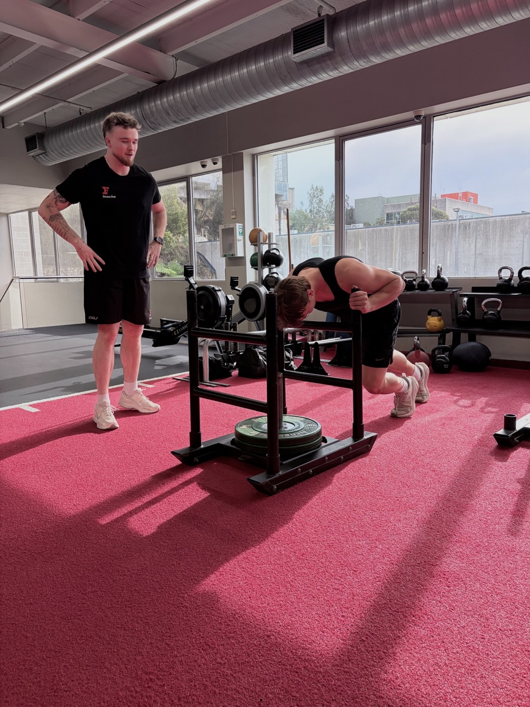 Coaching a sled push